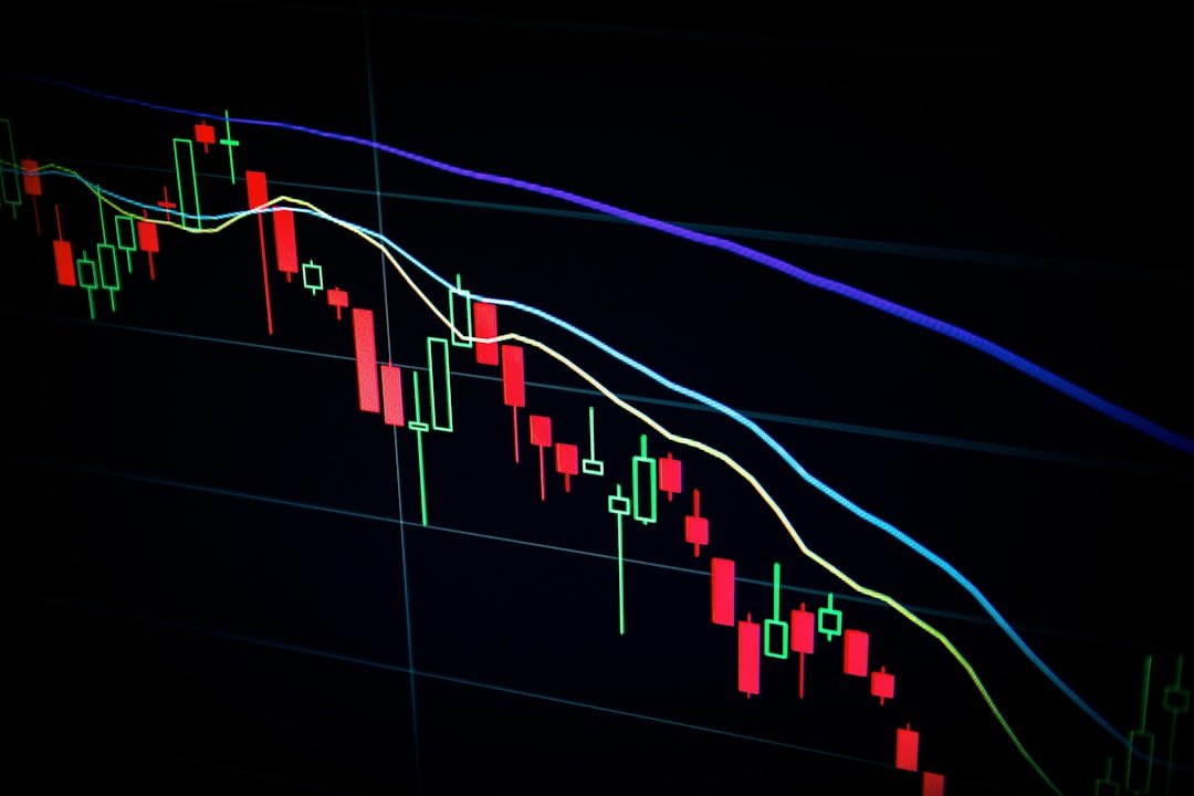 Candlestick trading chart on a dark screen representing daily forex market analysis