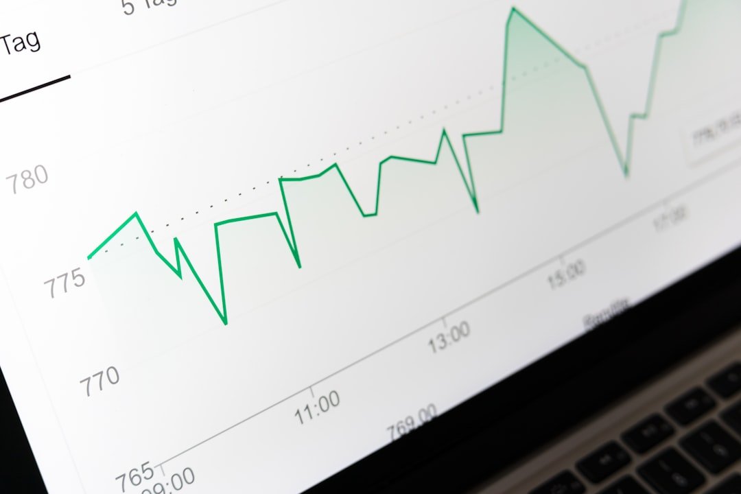 Stock market chart on a laptop screen illustrating GBP/USD technical analysis